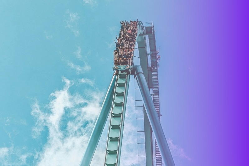 People on a rollercoaster
